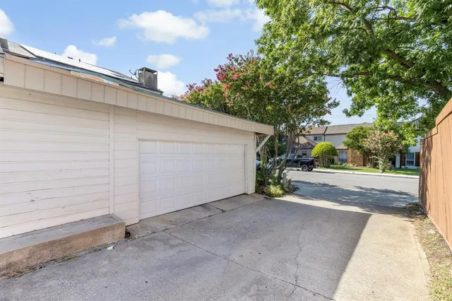 a view of a back yard of the house