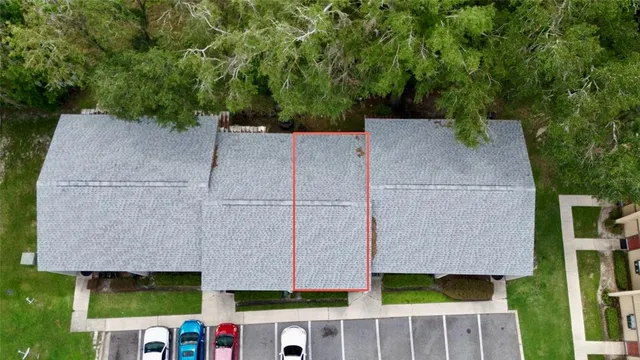 aerial view of a house with swimming pool and sitting area