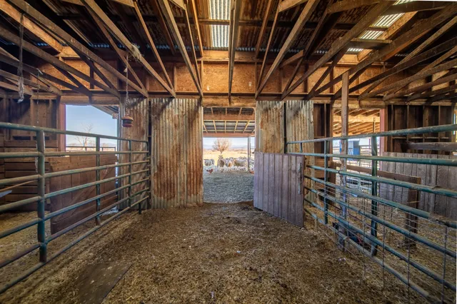 a view of a swimming pool with an outdoor space and seating area
