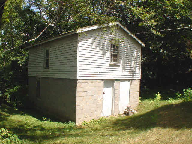 2548 South Middle Road New Market, VA 22844 - Photo 3 of 3 a front view of a house with garden