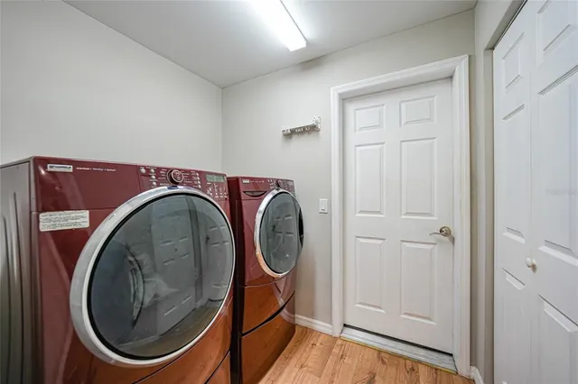a storage room with washer and dryer