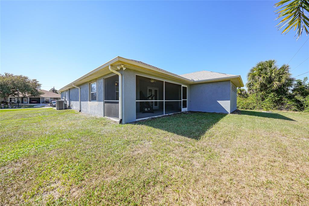 27234 Adams Street Punta Gorda, FL 33983 - Photo 27 of 29 a view of a house with a backyard