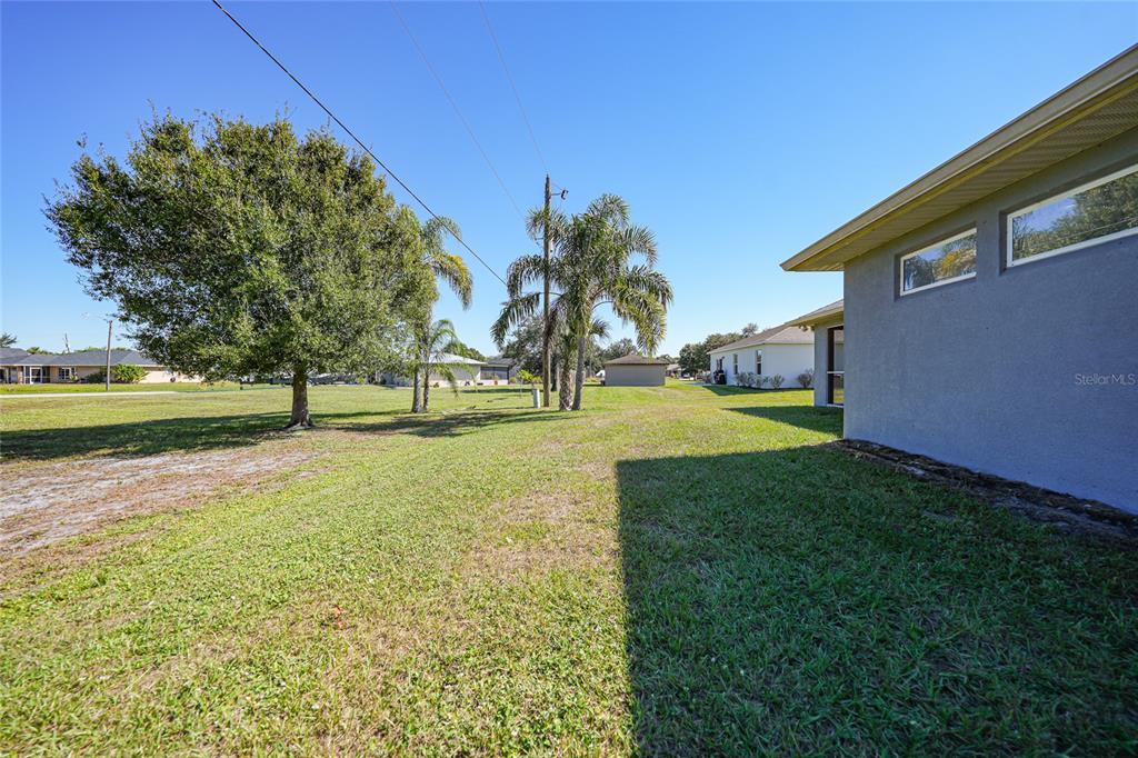 27234 Adams Street Punta Gorda, FL 33983 - Photo 28 of 29 a view of an outdoor space and yard