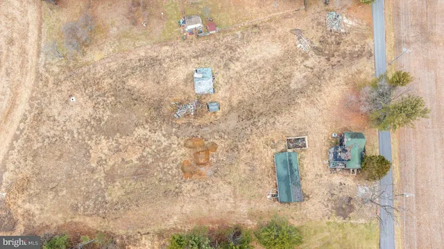 a view of a backyard of the house