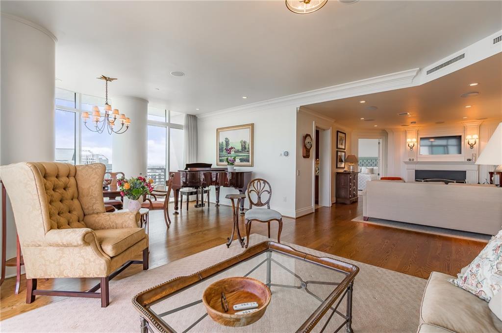 750 Park Avenue Northeast, Unit 29S Atlanta, GA 30326 - Photo 11 of 46 a living room with furniture and a wooden floor