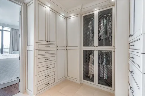 view of closet with clothes