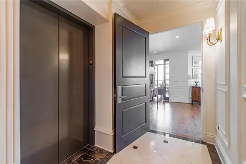 a view of a kitchen from the hallway
