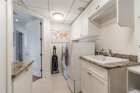 a bathroom with a sink vanity and a mirror