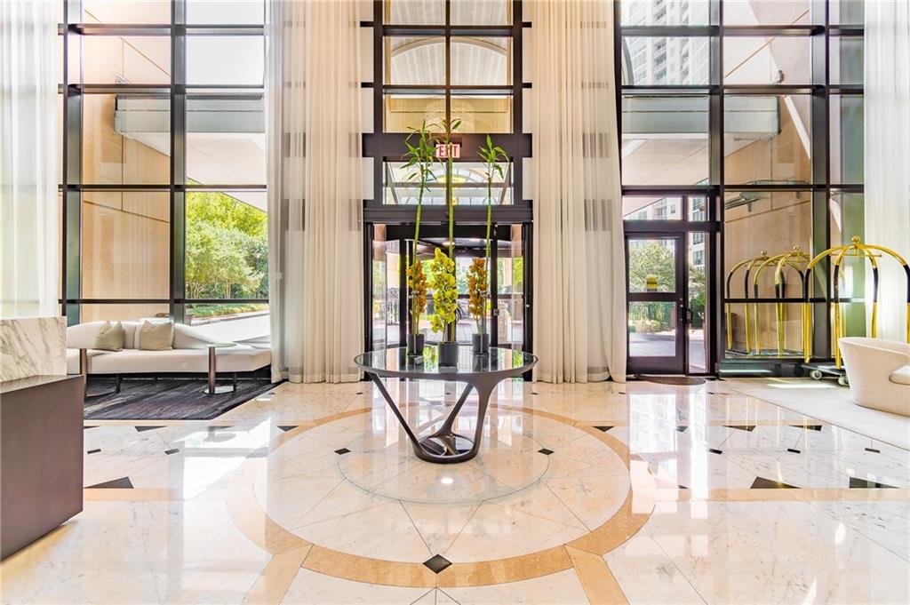 750 Park Avenue Northeast, Unit 29S Atlanta, GA 30326 - Photo 40 of 46 a view of a living room with large windows