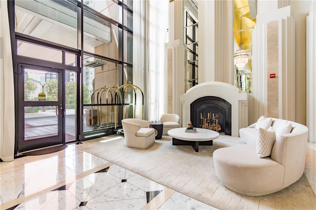 750 Park Avenue Northeast, Unit 29S Atlanta, GA 30326 - Photo 43 of 46 a living room with furniture and a large window