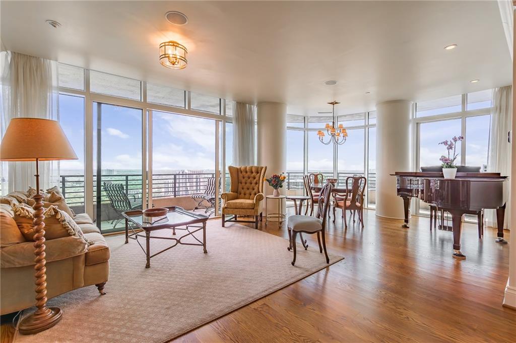 750 Park Avenue Northeast, Unit 29S Atlanta, GA 30326 - Photo 10 of 46 a living room with furniture and a large window