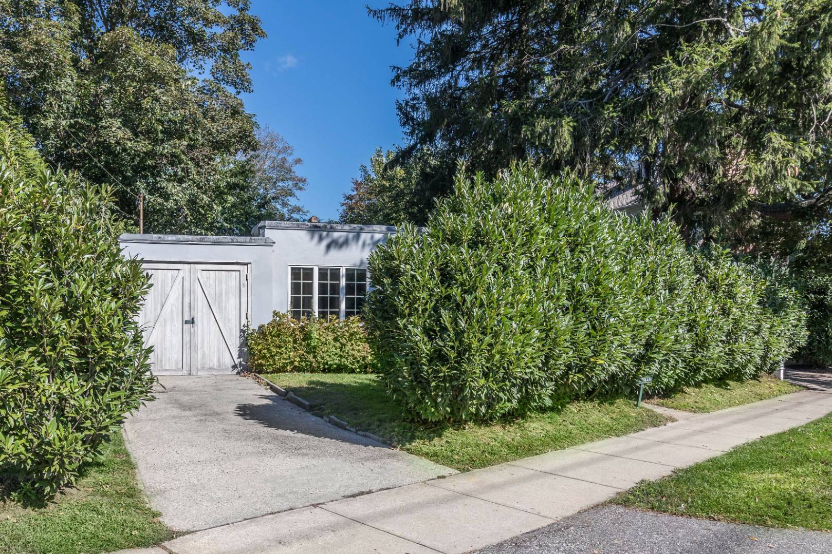 1 Sherrill Road East Hampton, NY 11937 - Photo 2 of 14 a house view with a outdoor space