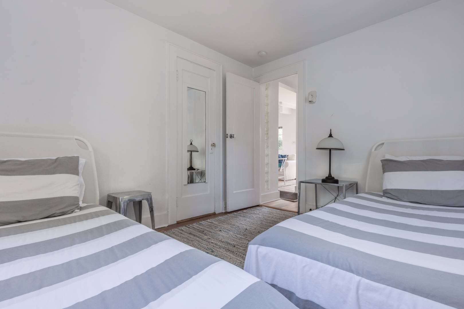 1 Sherrill Road East Hampton, NY 11937 - Photo 11 of 14 a bedroom with a bed and chair