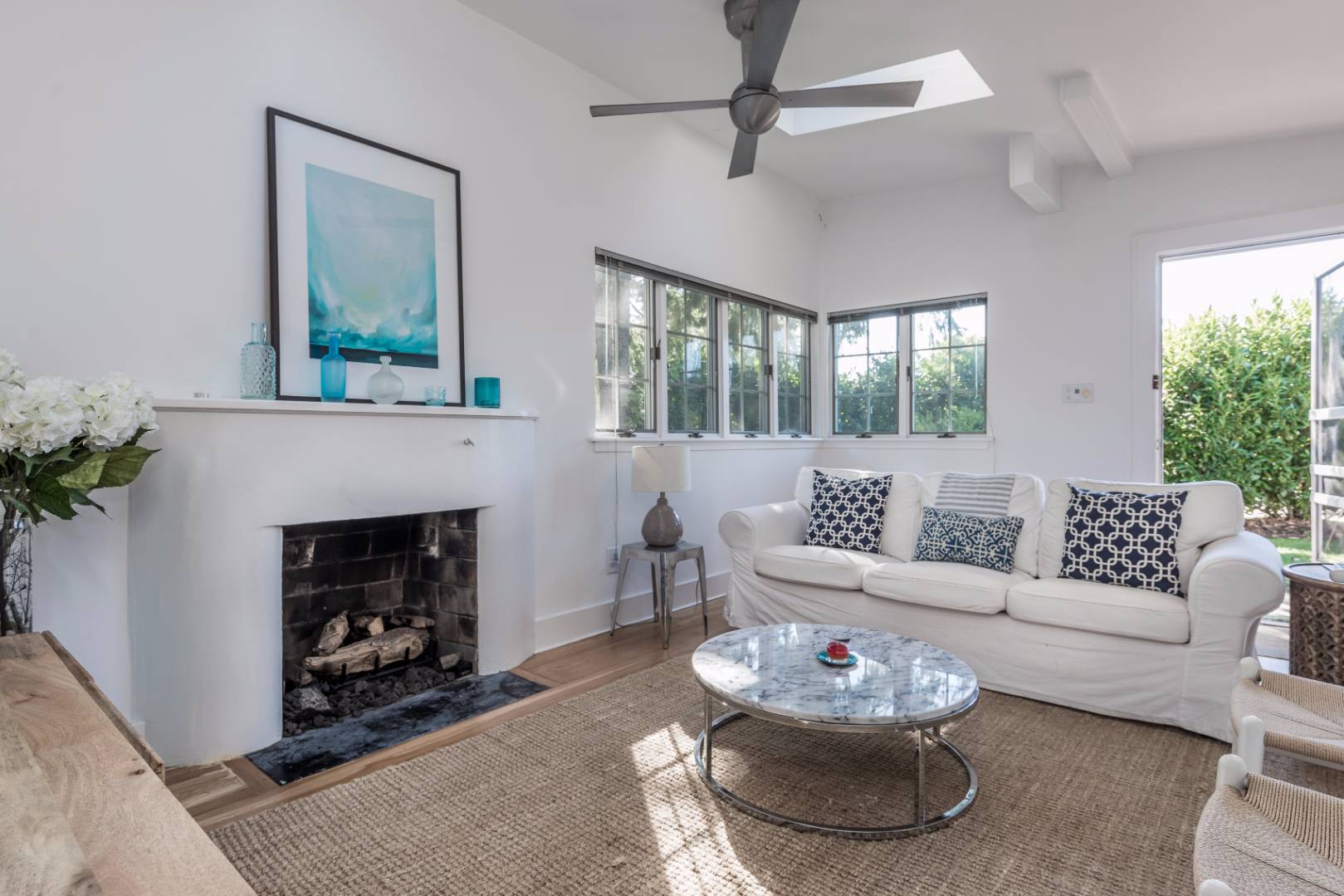 1 Sherrill Road East Hampton, NY 11937 - Photo 3 of 14 a living room with furniture a window and a fireplace