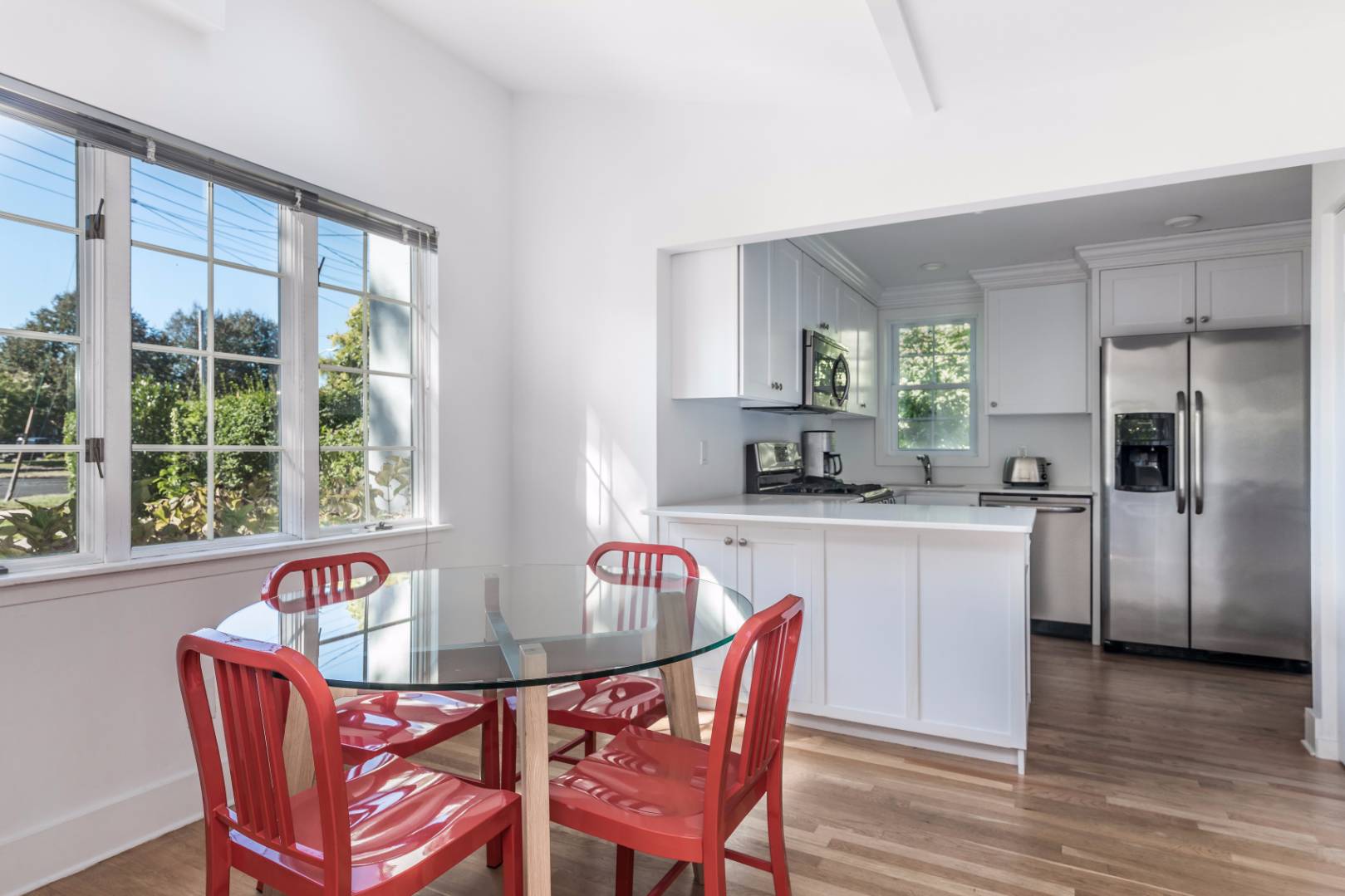 1 Sherrill Road East Hampton, NY 11937 - Photo 6 of 14 a kitchen with stainless steel appliances granite countertop a dining table and chairs