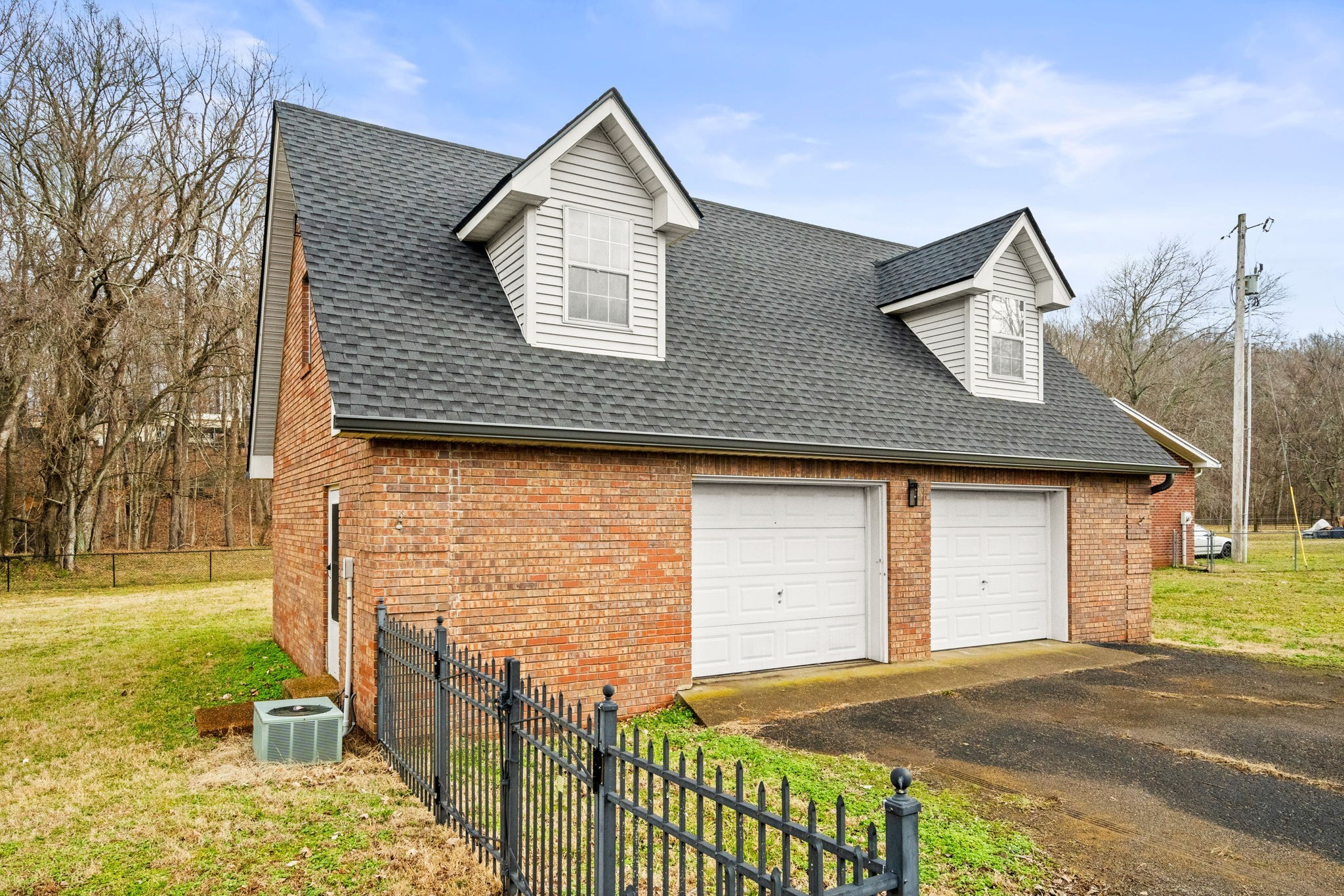 1054 Maxwell Branch Road Cottontown, TN 37048 - Photo 54 of 62 a front view of a house with a yard