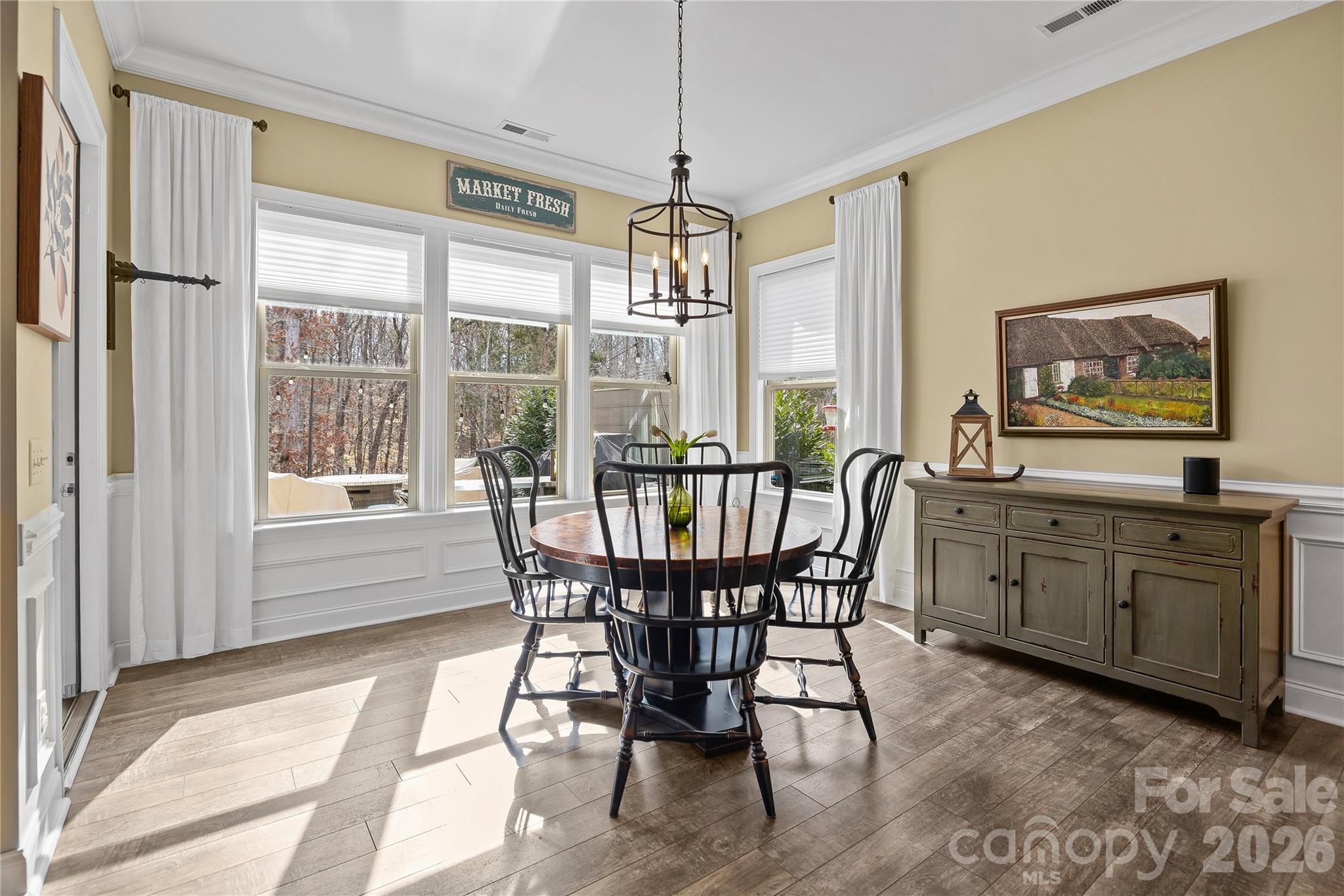 1106 Castle Road Fort Mill, SC 29707 - Photo 17 of 44 a view of a dining room with furniture window and outside view
