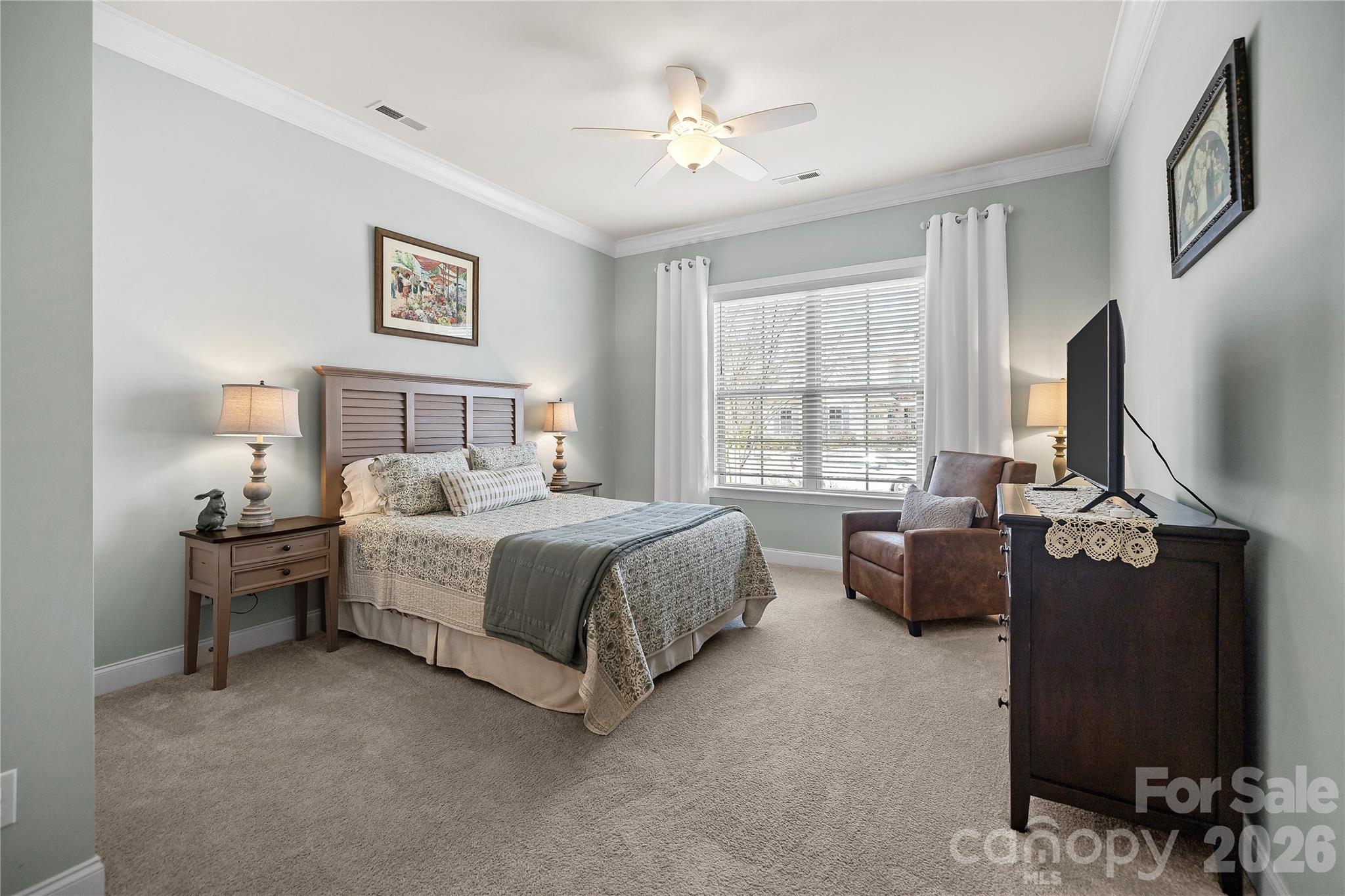 1106 Castle Road Fort Mill, SC 29707 - Photo 25 of 44 a bedroom with a bed dresser and a window
