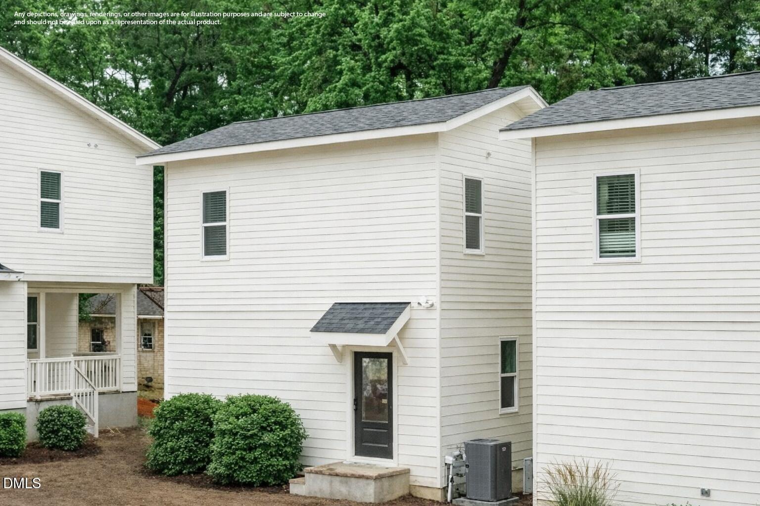 2811 Wilcox Street, Unit 103 Raleigh, NC 27607 - Photo 1 of 17 a front view of a house with garden