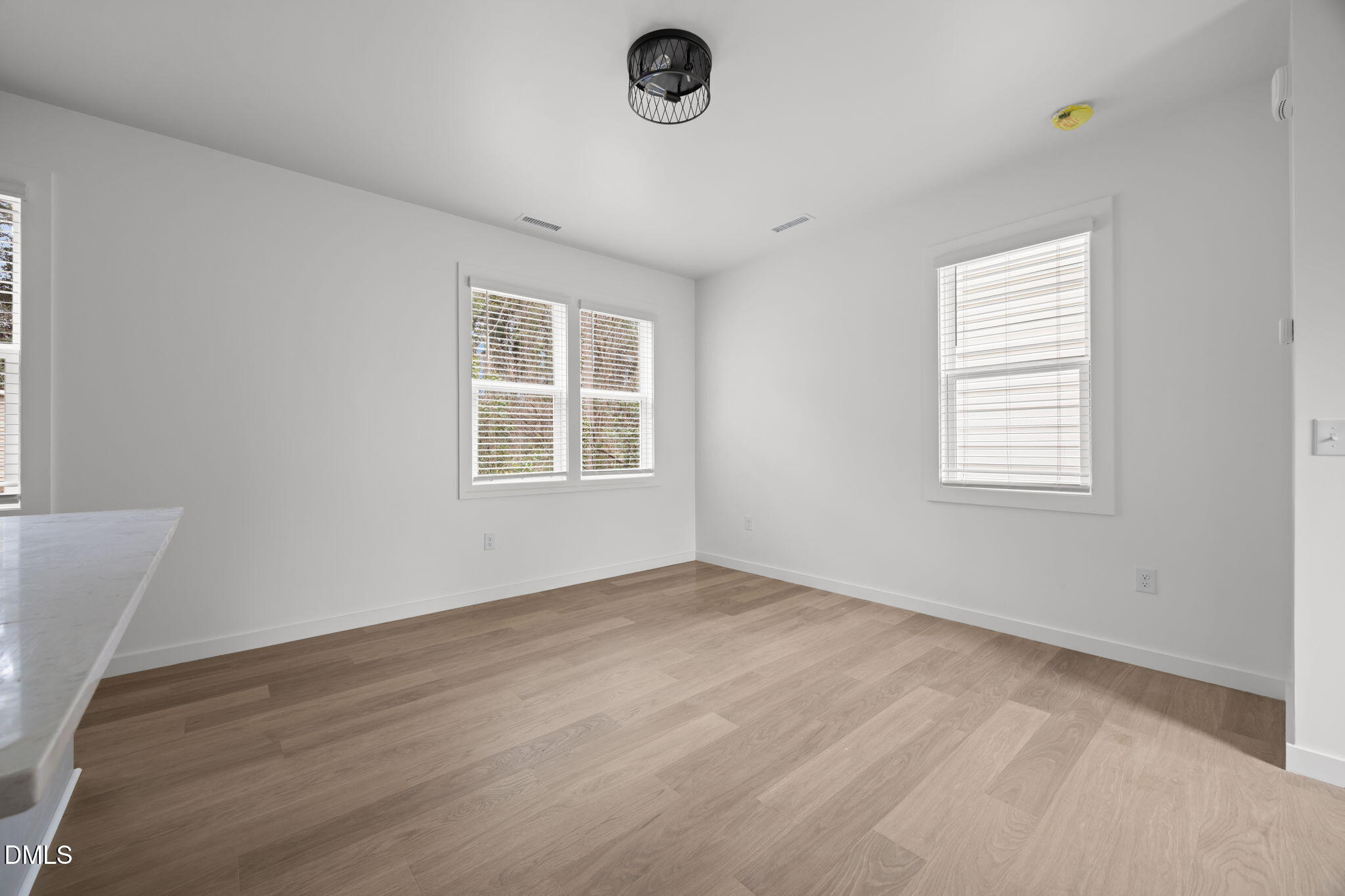 2811 Wilcox Street, Unit 103 Raleigh, NC 27607 - Photo 15 of 17 an empty room with window