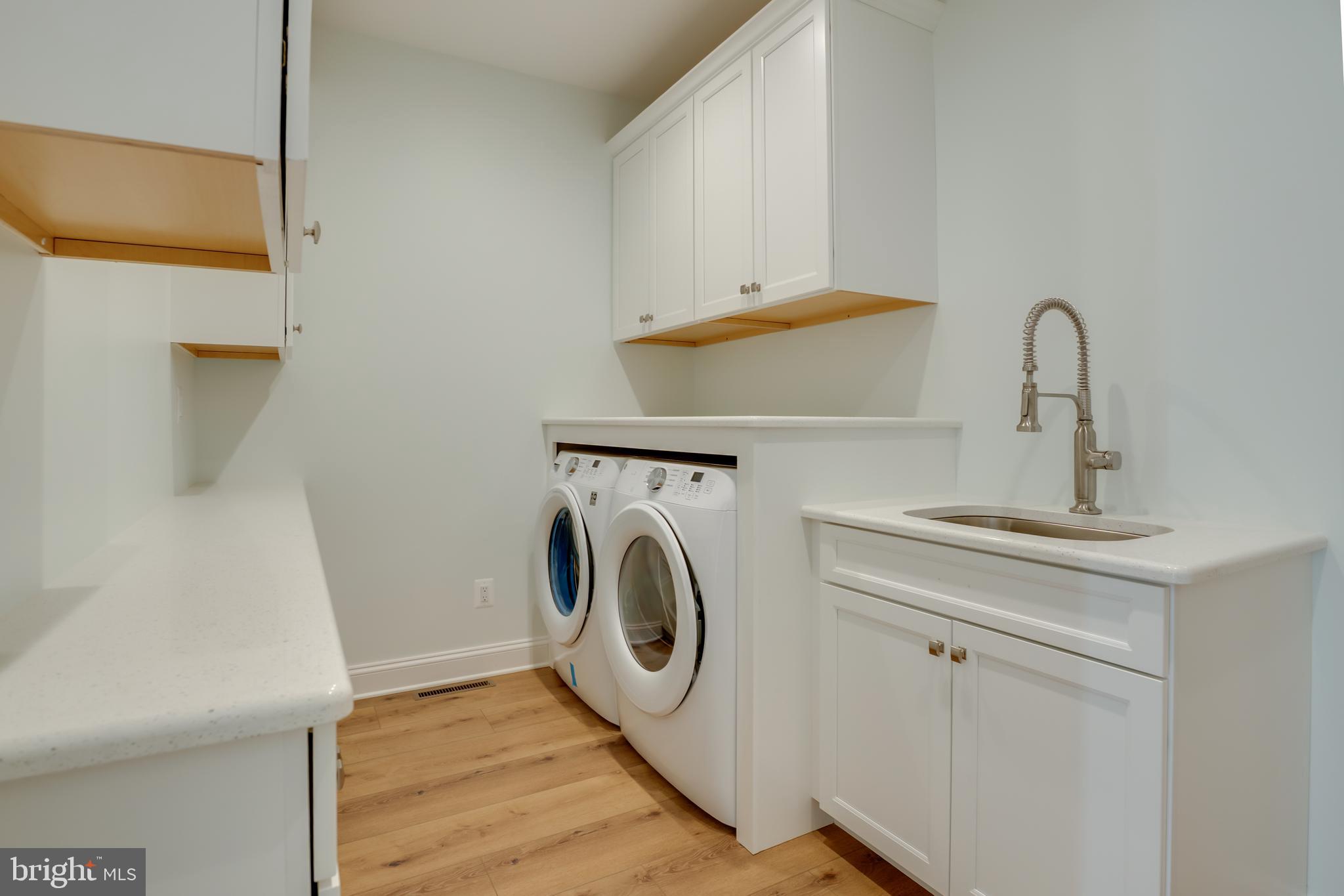 205 River Road Chestertown, MD 21620 - Photo 42 of 72 a utility room with sink dryer and washer