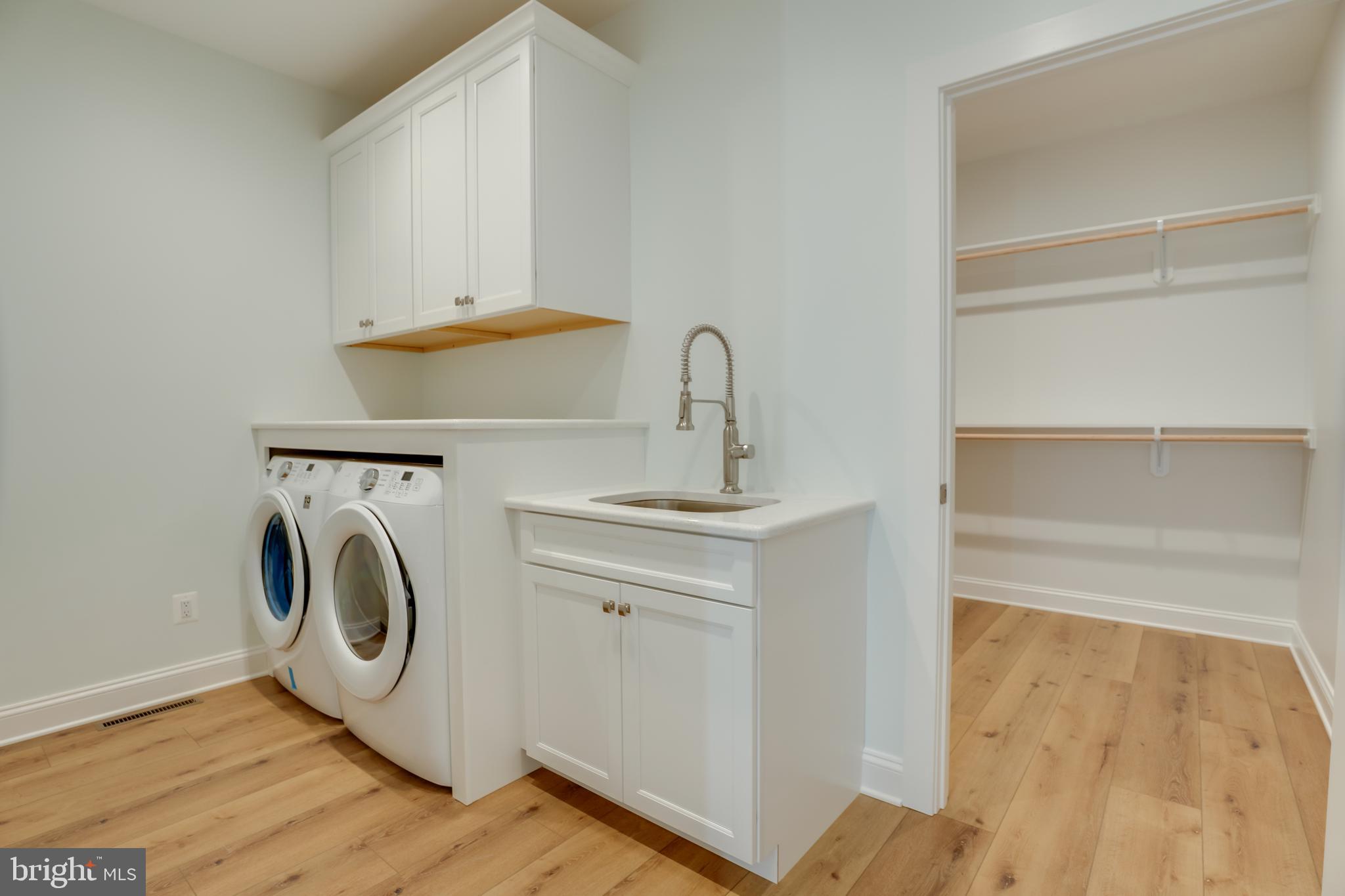 205 River Road Chestertown, MD 21620 - Photo 43 of 72 a utility room with sink dryer and washer
