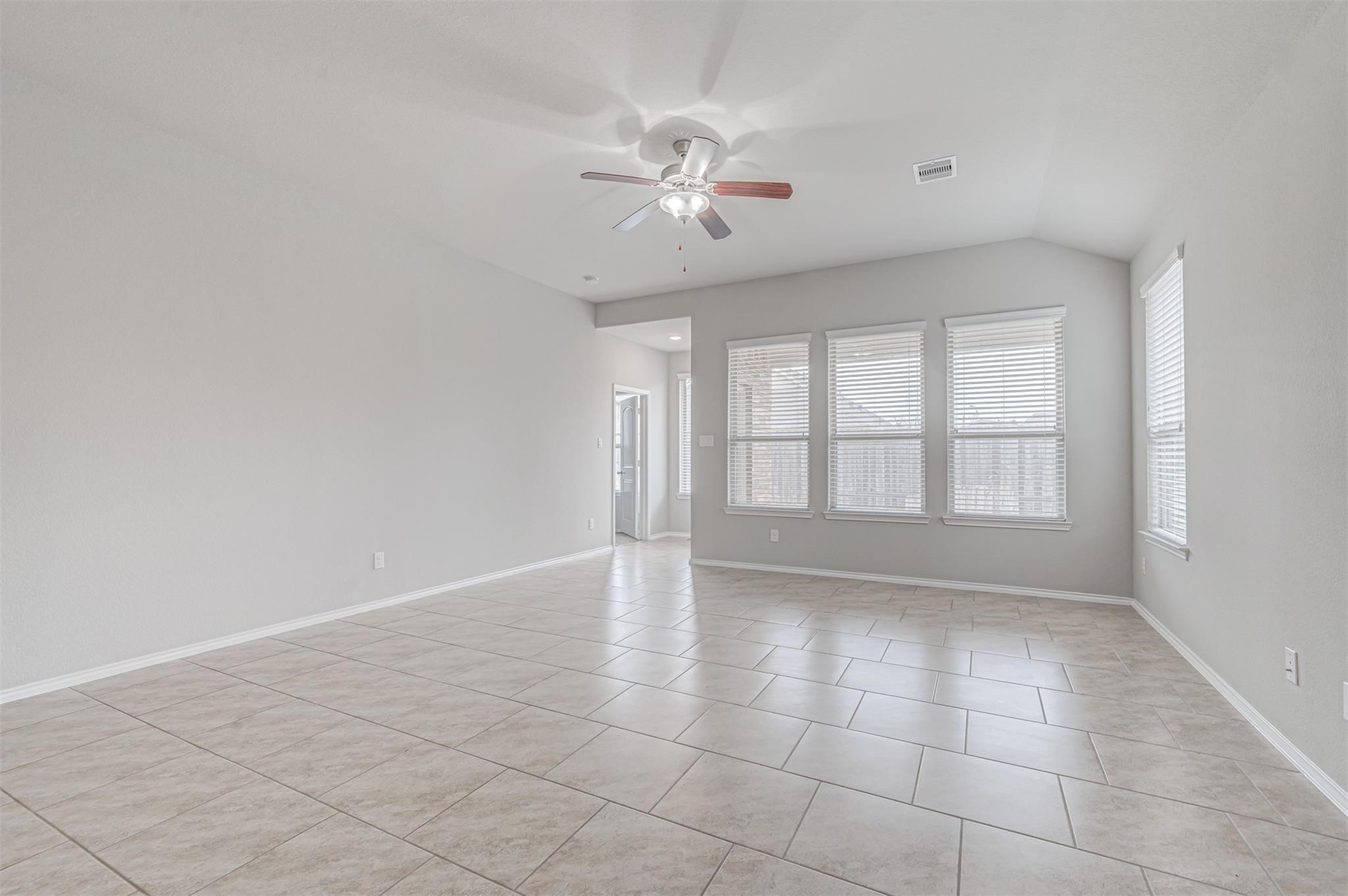 24311 North Newcastle Bay Trail Spring, TX 77389 - Photo 11 of 25 a view of an empty room with a window
