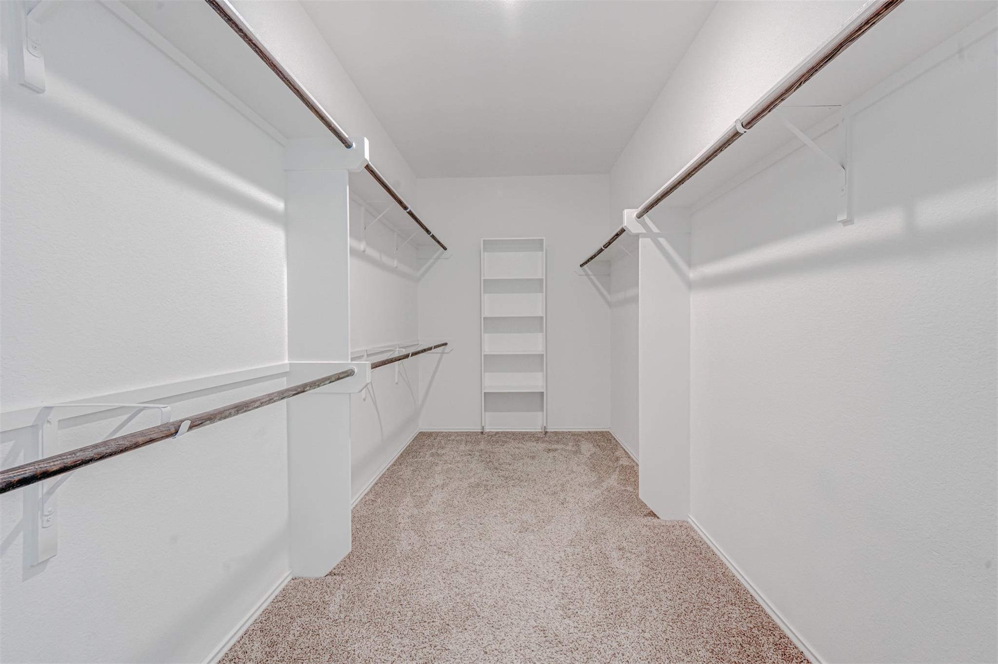 24311 North Newcastle Bay Trail Spring, TX 77389 - Photo 18 of 25 a view of an empty walk in closet
