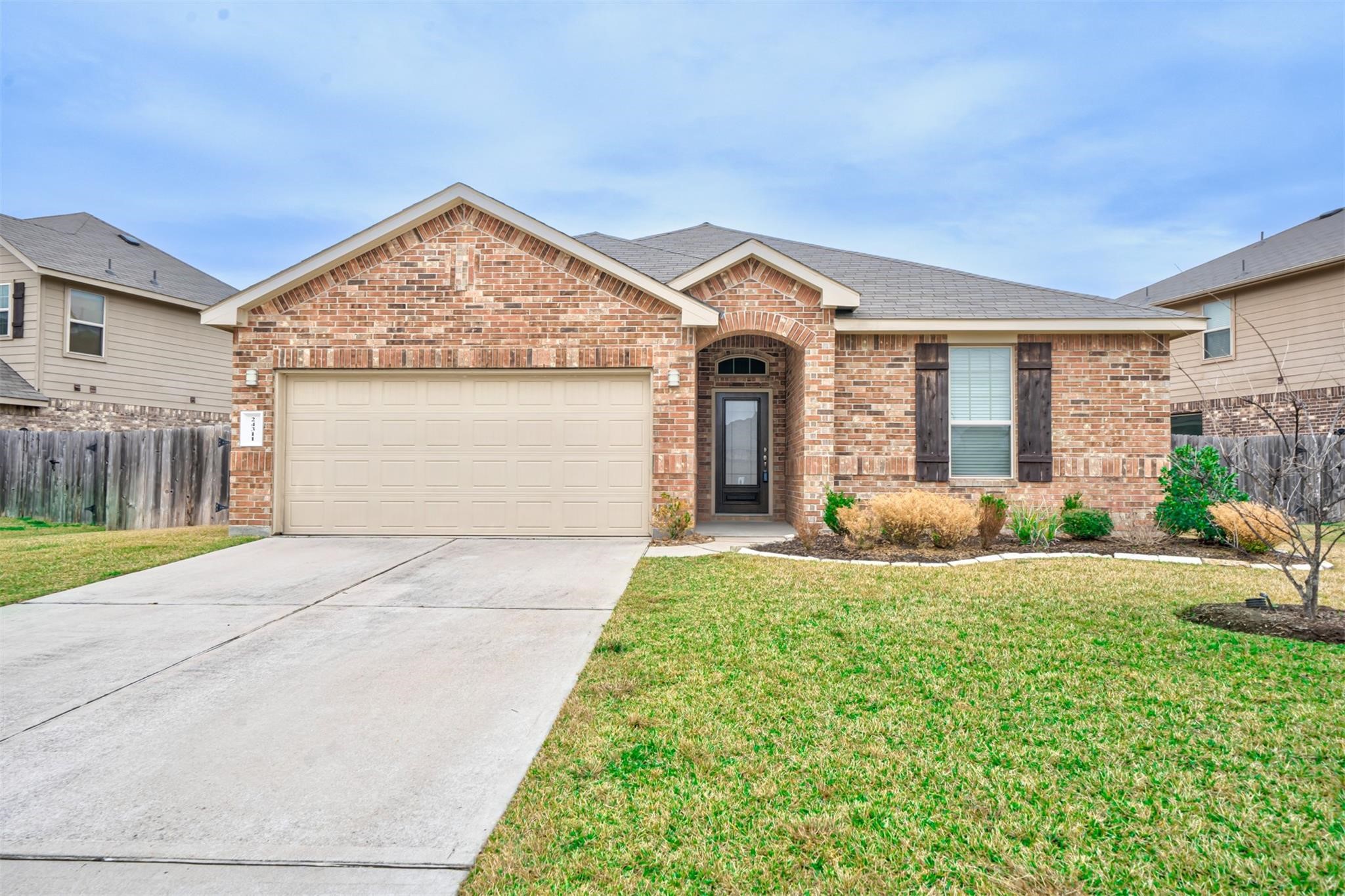 24311 North Newcastle Bay Trail Spring, TX 77389 - Photo 25 of 25 a view of a house with backyard and porch