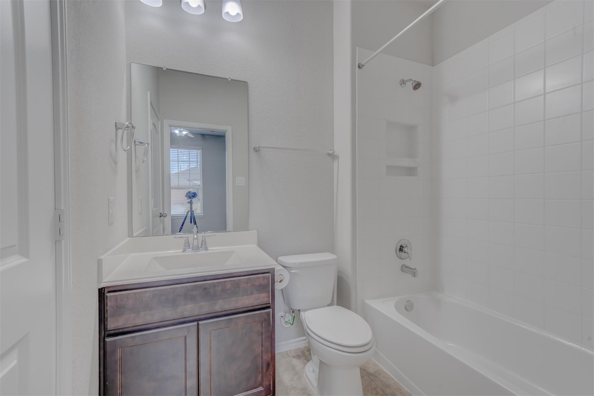 24311 North Newcastle Bay Trail Spring, TX 77389 - Photo 4 of 25 a bathroom with a sink toilet and shower