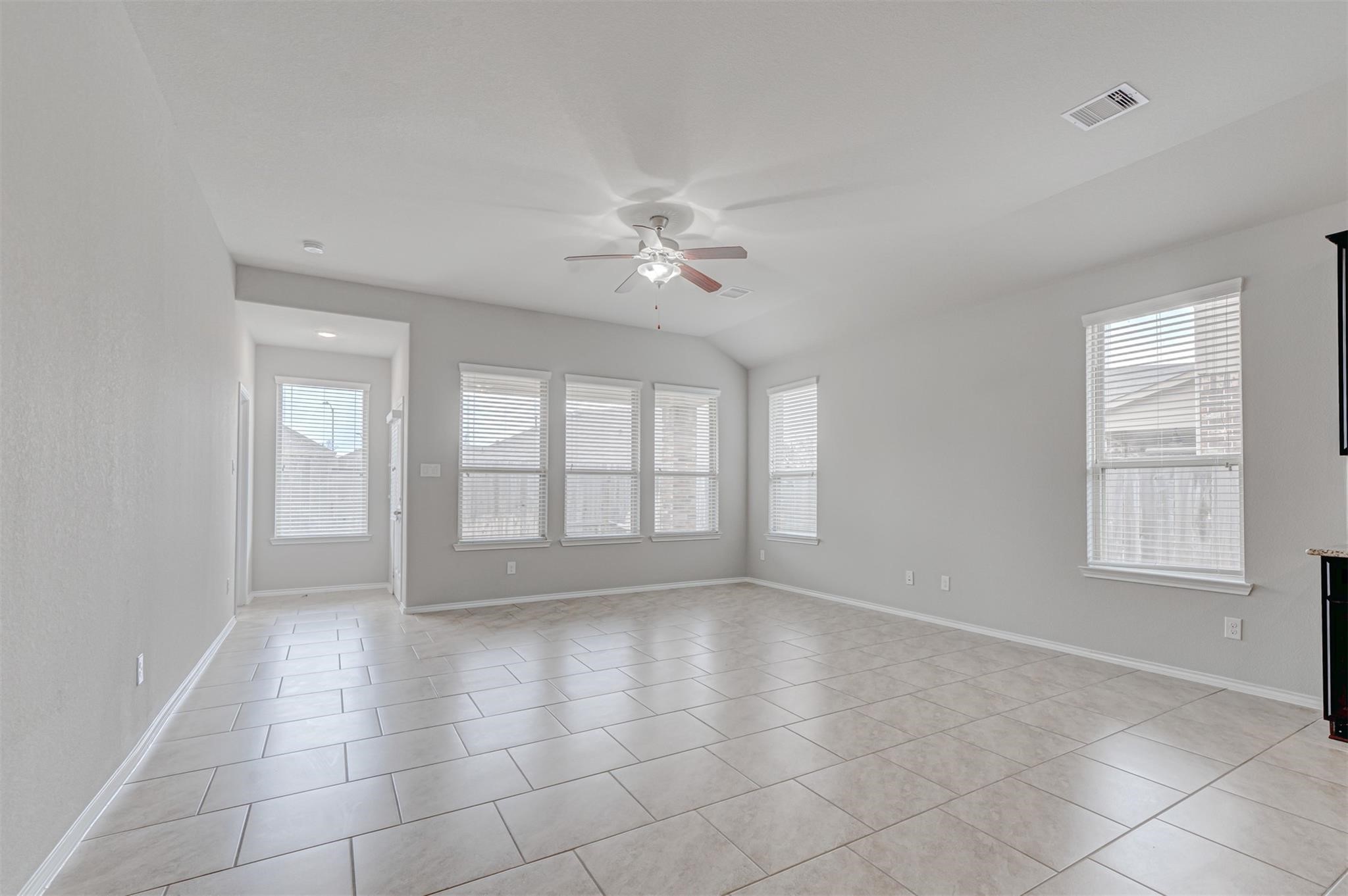 24311 North Newcastle Bay Trail Spring, TX 77389 - Photo 10 of 25 a view of an empty room with a window