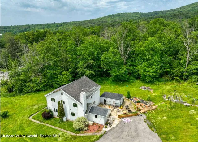 a aerial view of a house with garden
