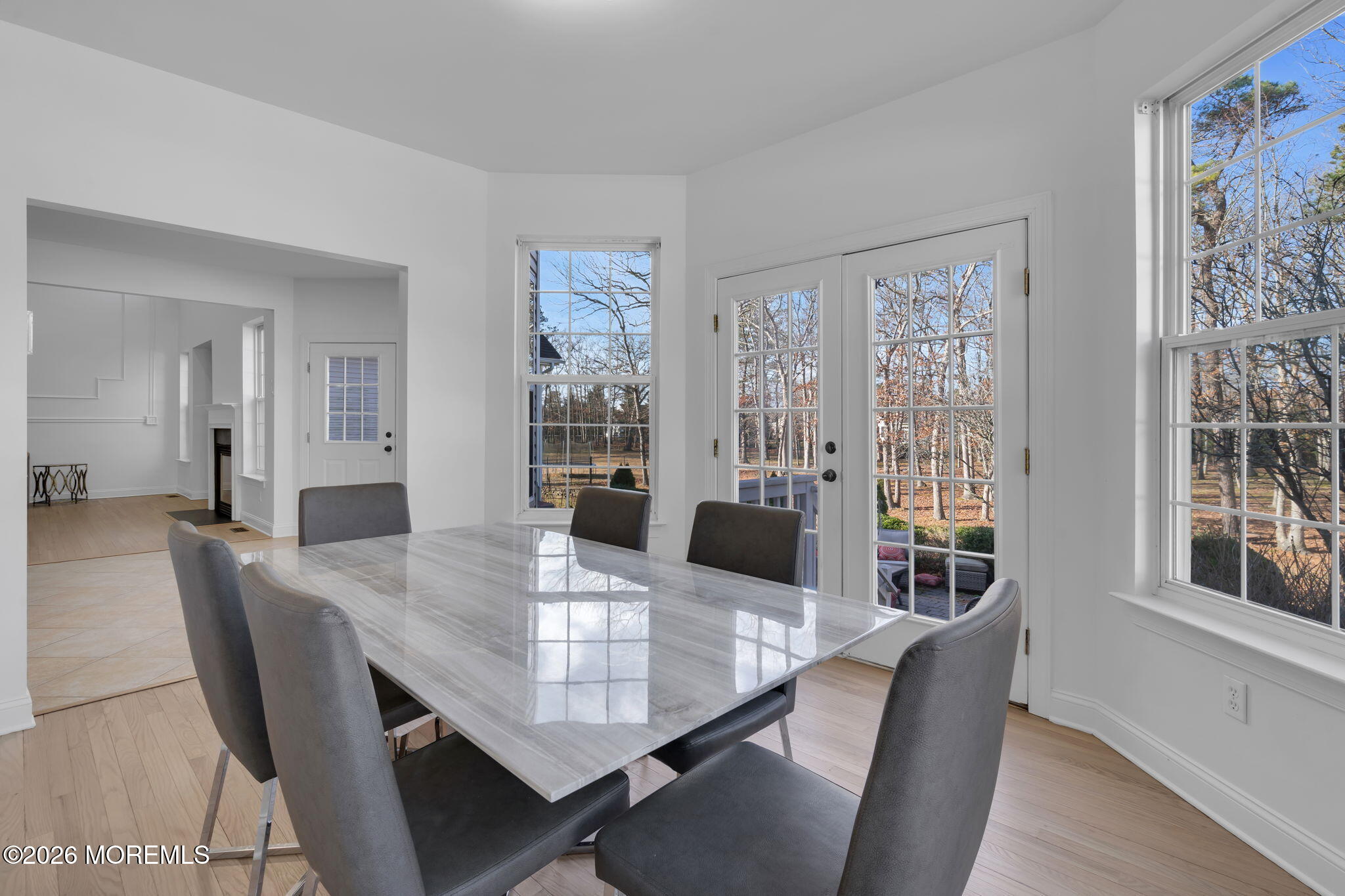 10 Meadow Run Court Jackson, NJ 08527 - Photo 15 of 84 a view of a dining room with furniture and wooden floor