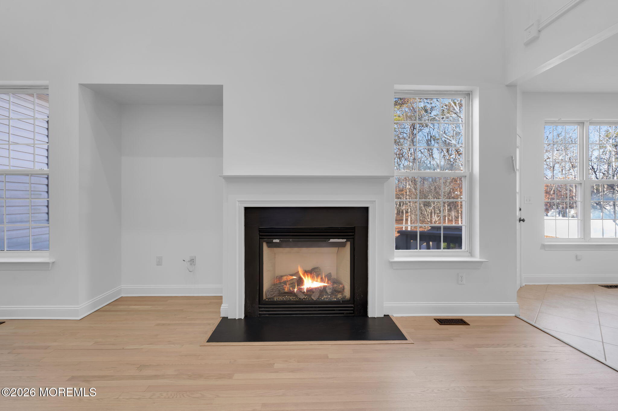 10 Meadow Run Court Jackson, NJ 08527 - Photo 23 of 84 a living room with a fireplace and a fireplace