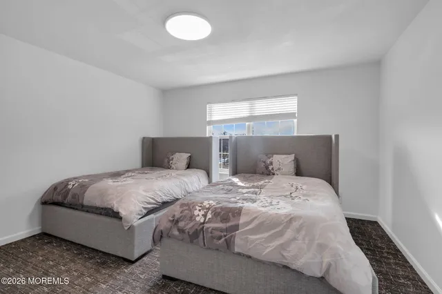 an aerial view of a house with a garden