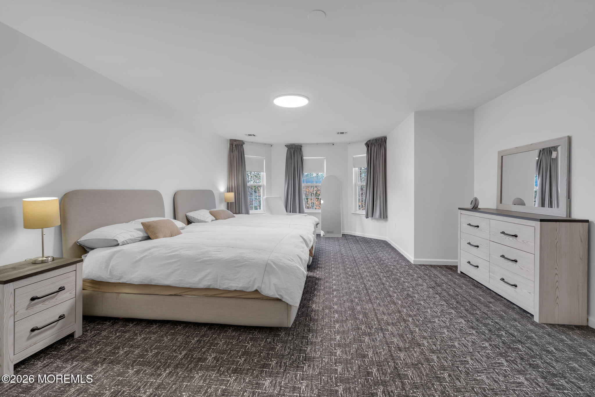 10 Meadow Run Court Jackson, NJ 08527 - Photo 48 of 84 a spacious bedroom with a bed and a dresser