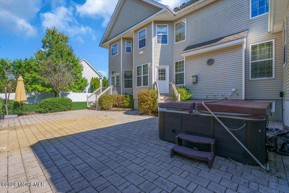 10 Meadow Run Court Jackson, NJ 08527 - Photo 66 of 84 a backyard of a house with barbeque oven table and chairs