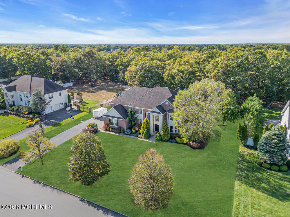 10 Meadow Run Court Jackson, NJ 08527 - Photo 79 of 84 a view of a house with a big yard potted plants and large tree