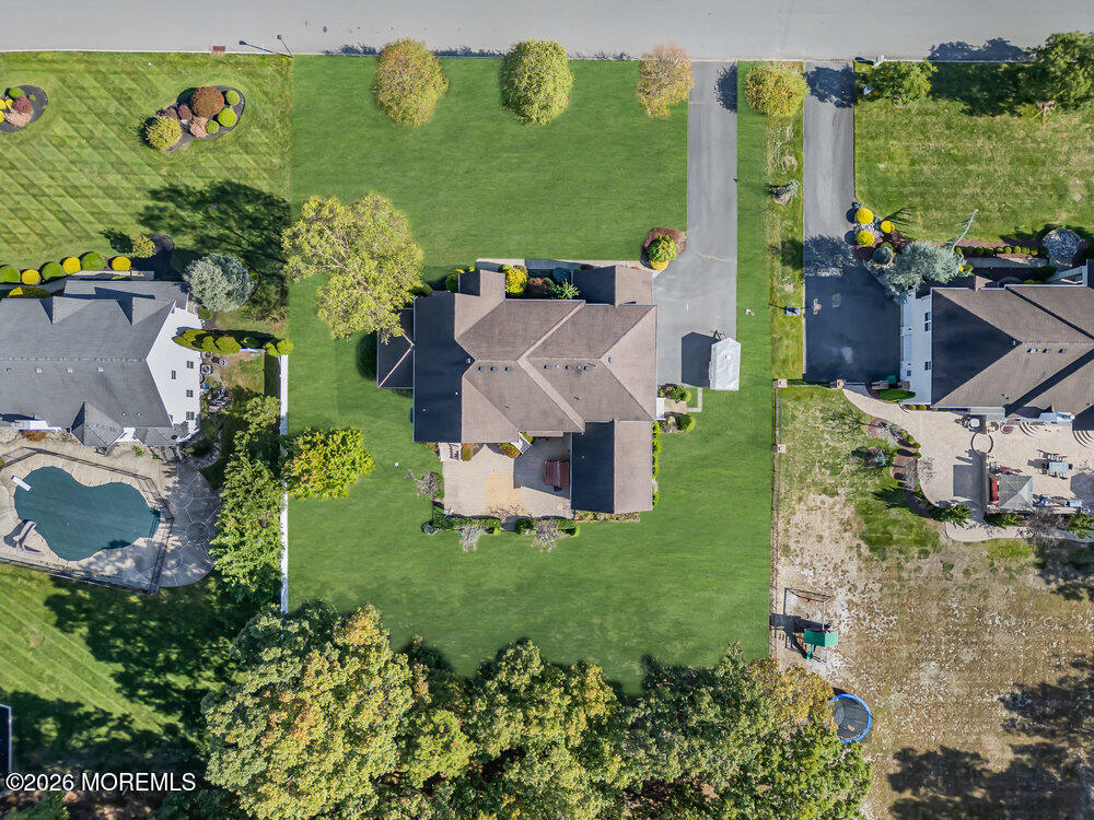 10 Meadow Run Court Jackson, NJ 08527 - Photo 81 of 84 an aerial view of a house with a garden and lots of plants and water view