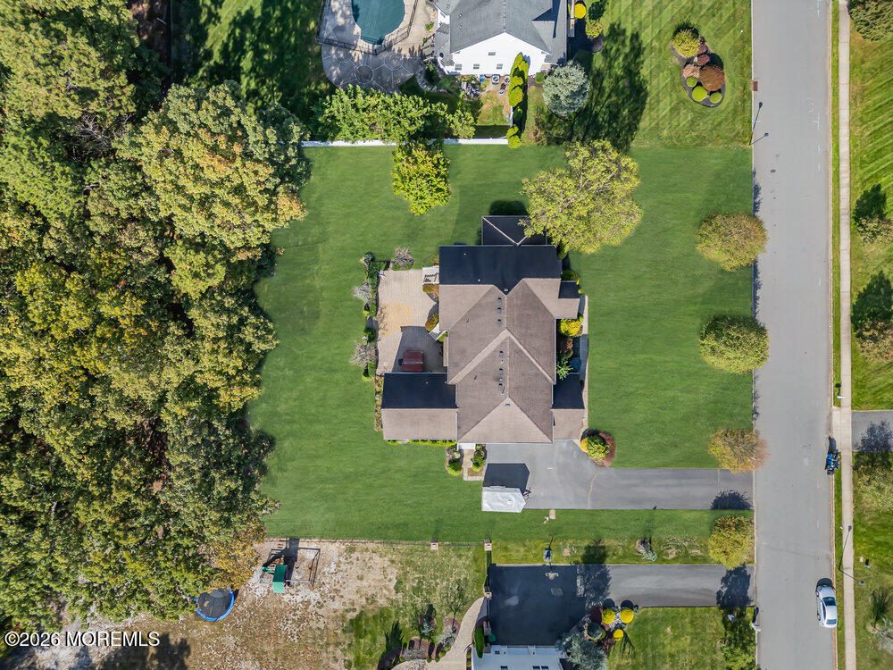 10 Meadow Run Court Jackson, NJ 08527 - Photo 82 of 84 an aerial view of a house with a yard