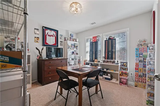 a view of a livingroom with furniture and window