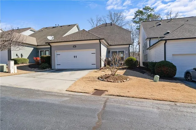 a view of a pathway with a yard