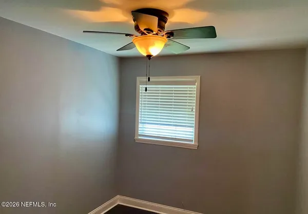 a window in an empty room with a window