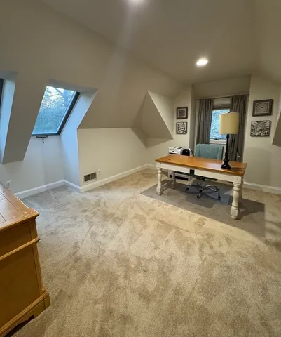 a view of a livingroom with furniture