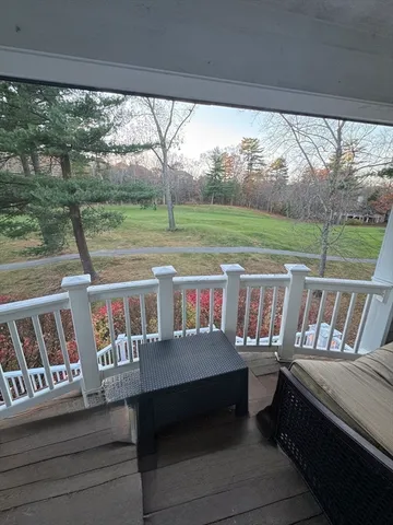a view of a chairs and table in the deck