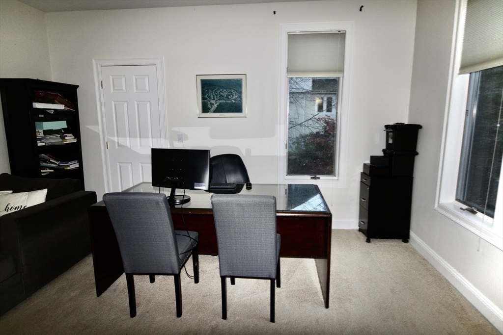 196 Country Club Way Ipswich, MA 01938 - Photo 28 of 33 a dining room with furniture and fireplace