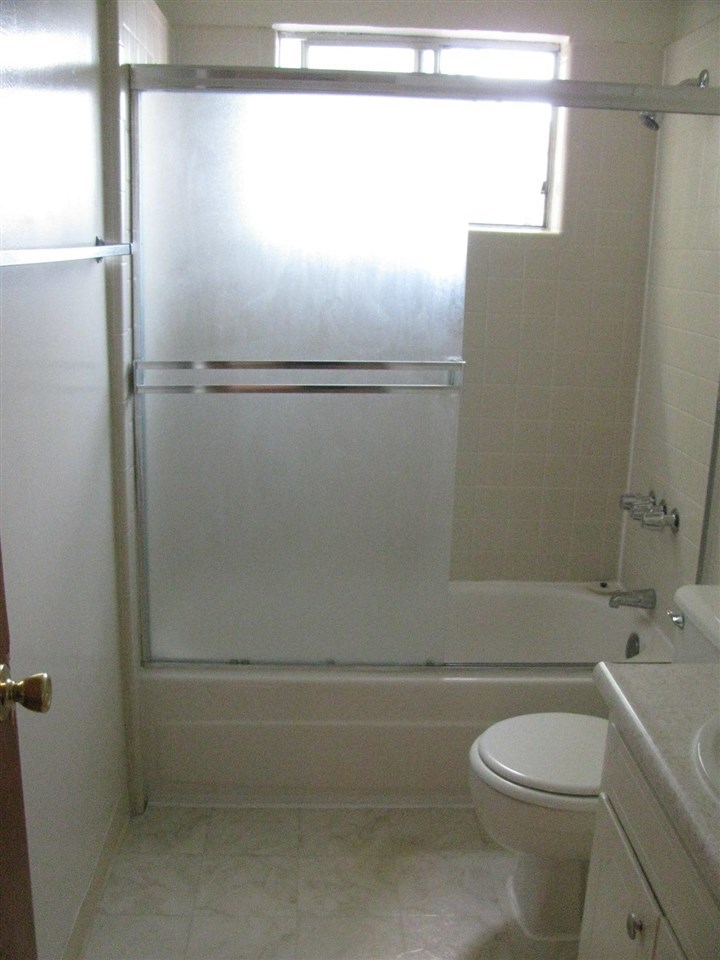 2375 Chestnut Street Livermore, CA 94551 - Photo 8 of 11 a bathroom with a toilet and a shower