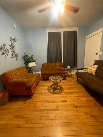 a bedroom with a bed and a cabinets