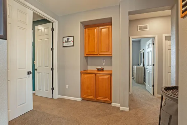 a bedroom with a bed and a closet