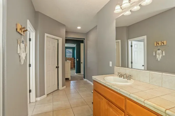 a bathroom with a bathtub and a window
